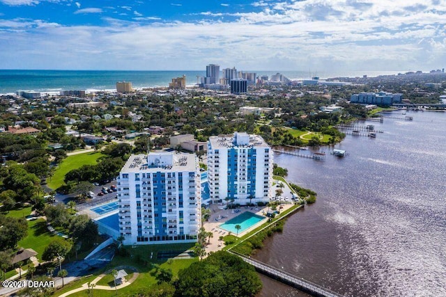 birds eye view of property featuring a water view