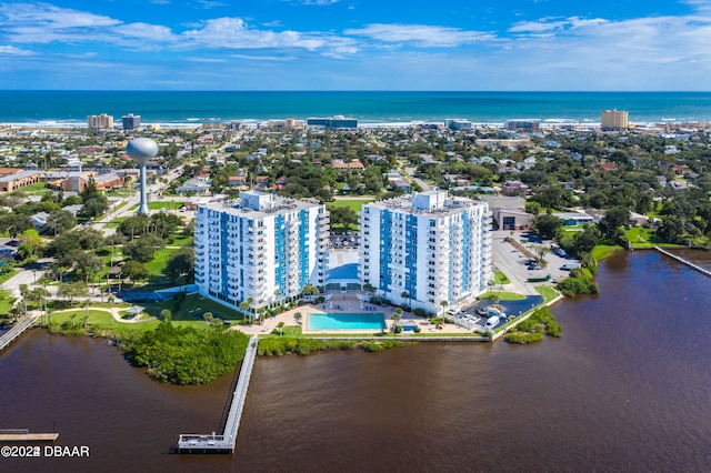 drone / aerial view with a water view