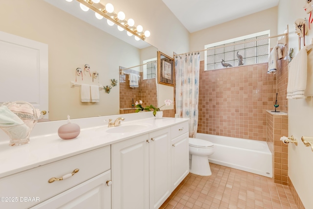 203 Prestwick Dr, New Smyrna Beach, FL 32168 - full bathroom featuring vanity, shower / bath combo, toilet, and tile patterned floors
