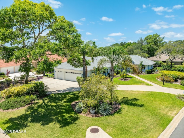 203 Prestwick Dr, New Smyrna Beach, FL 32168 - view of property hidden behind natural elements featuring a front lawn, driveway, and a garage