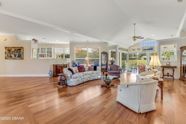 203 Prestwick Dr, New Smyrna Beach, FL 32168 - living room with ceiling fan, healthy amount of natural light, baseboards, light wood-type flooring, and ornamental molding