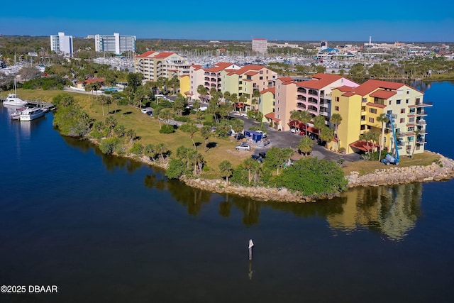 bird's eye view with a city view and a water view