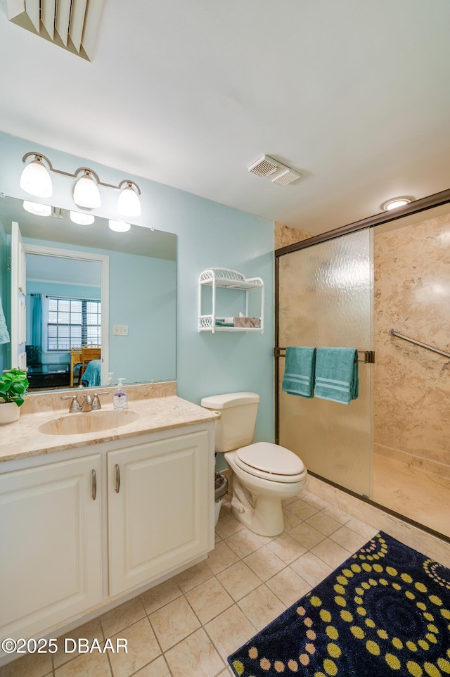 full bathroom with tile patterned flooring, visible vents, a shower stall, toilet, and vanity