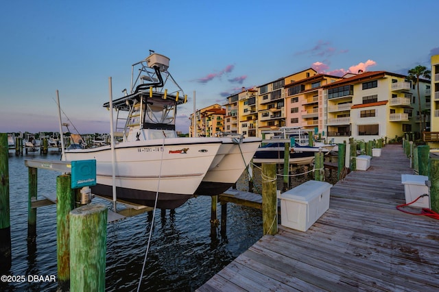 dock area featuring a water view and boat lift