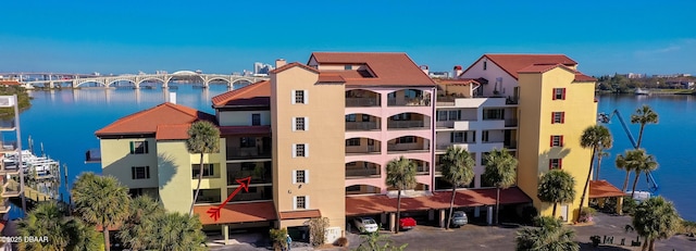 view of building exterior featuring a water view