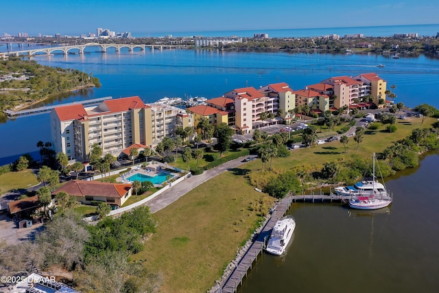 drone / aerial view with a water view