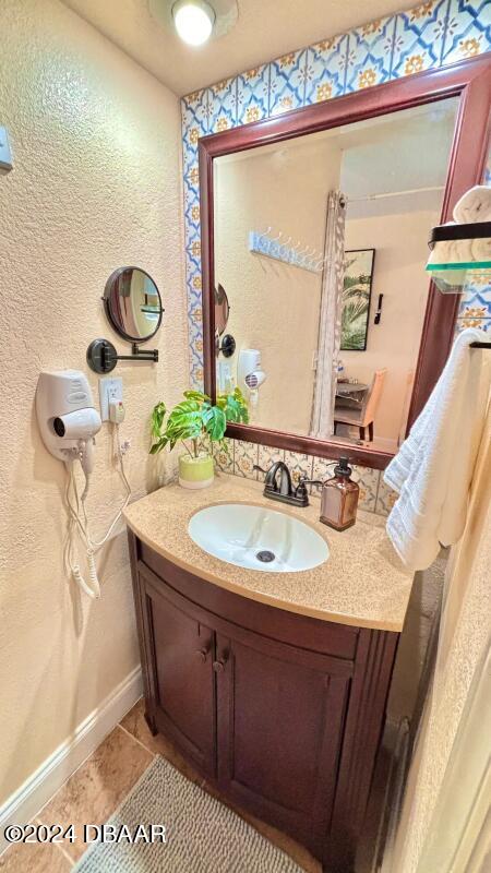 bathroom featuring vanity and tile patterned floors