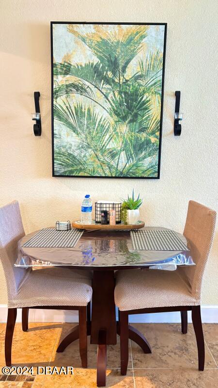 view of tiled dining space