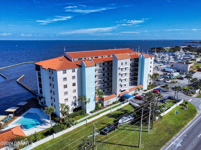 drone / aerial view with a water view