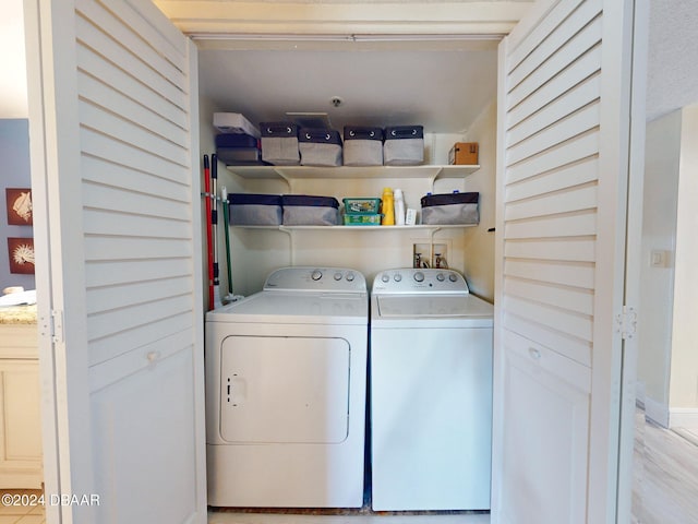 washroom with washer and clothes dryer