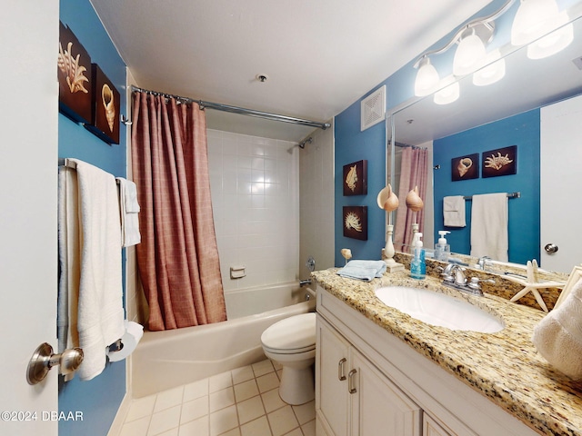 full bathroom with tile patterned floors, vanity, toilet, and shower / bathtub combination with curtain