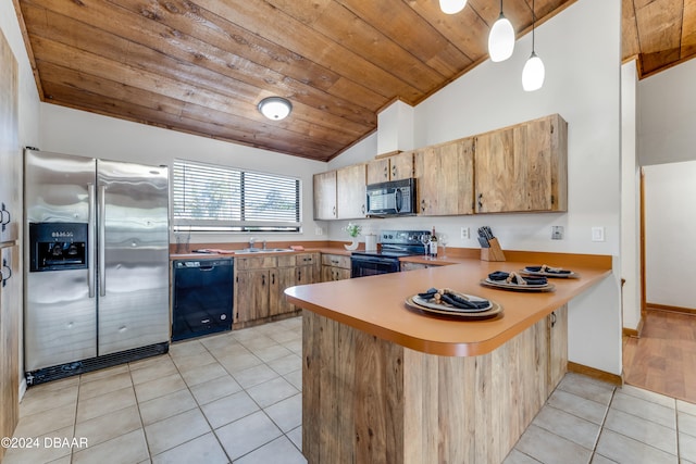 kitchen featuring light tile patterned flooring, black appliances, decorative light fixtures, and vaulted ceiling