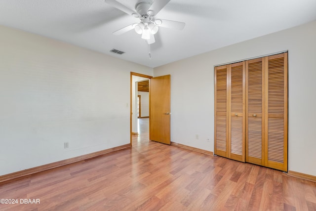 500 Sandy Oaks Blvd, Ormond Beach, FL 32174 - unfurnished bedroom with light wood-style floors, baseboards, a closet, and a ceiling fan