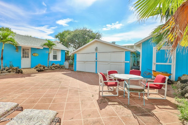 view of patio featuring an outdoor structure