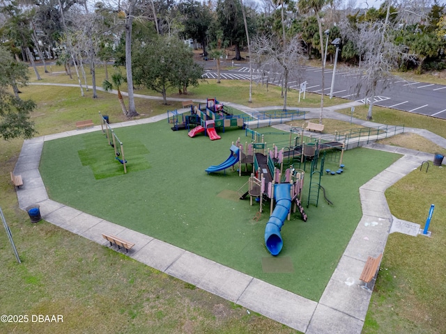 surrounding community featuring a yard and a playground