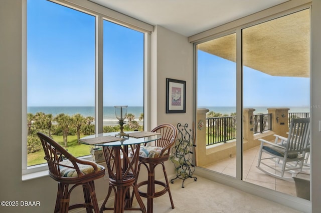 20 Porto Mar Unit 302, Palm Coast, FL 32137 - sunroom / solarium featuring a water view