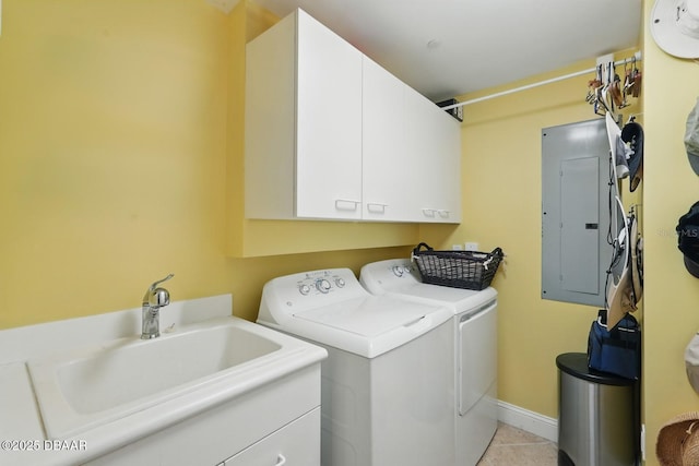 20 Porto Mar Unit 302, Palm Coast, FL 32137 - laundry room with electric panel, cabinet space, independent washer and dryer, and light tile patterned floors