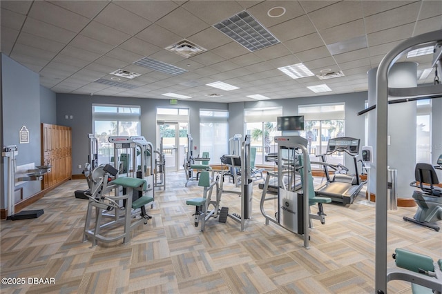 20 Porto Mar Unit 302, Palm Coast, FL 32137 - workout area with light carpet and a paneled ceiling