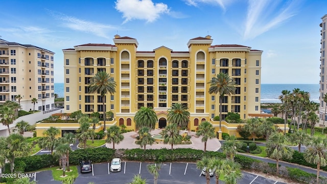 20 Porto Mar Unit 302, Palm Coast, FL 32137 - view of property with uncovered parking and a water view