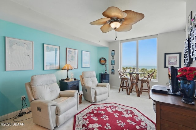 20 Porto Mar Unit 302, Palm Coast, FL 32137 - living area featuring light carpet and a ceiling fan