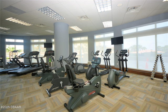 20 Porto Mar Unit 302, Palm Coast, FL 32137 - exercise room featuring carpet flooring and a paneled ceiling