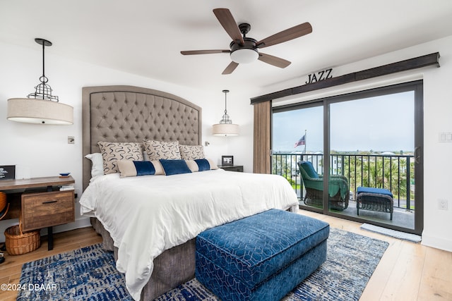 bedroom featuring access to exterior, ceiling fan, and hardwood / wood-style flooring