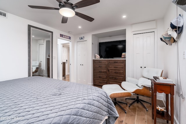 bedroom featuring ceiling fan and hardwood / wood-style flooring