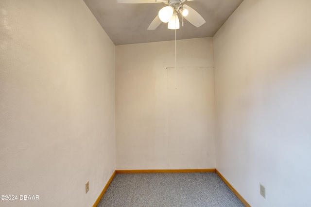 spare room with carpet flooring and ceiling fan