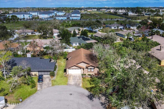 birds eye view of property with a residential view