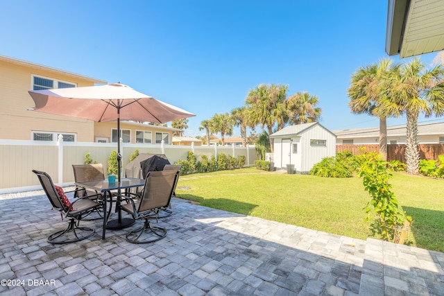 view of patio featuring a storage unit