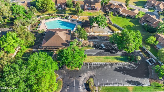 208 Pine Cone Trl, Ormond Beach, FL 32174 - aerial view of property and surrounding area with a pool and nearby suburban area