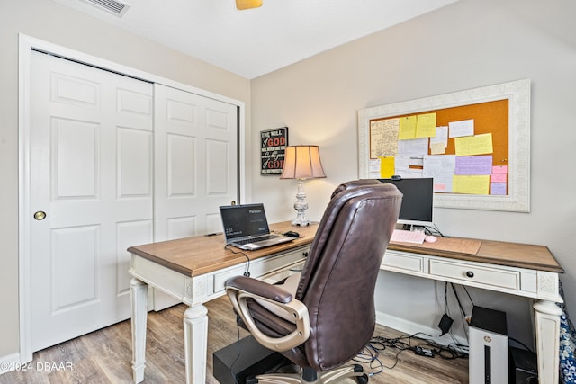 office space featuring light hardwood / wood-style floors