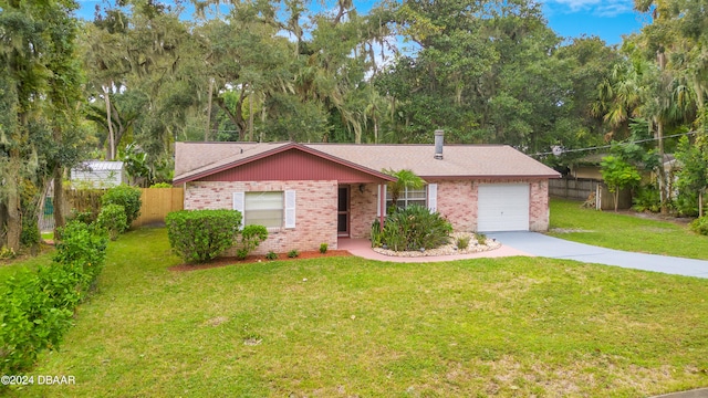 ranch-style home with a garage and a front yard