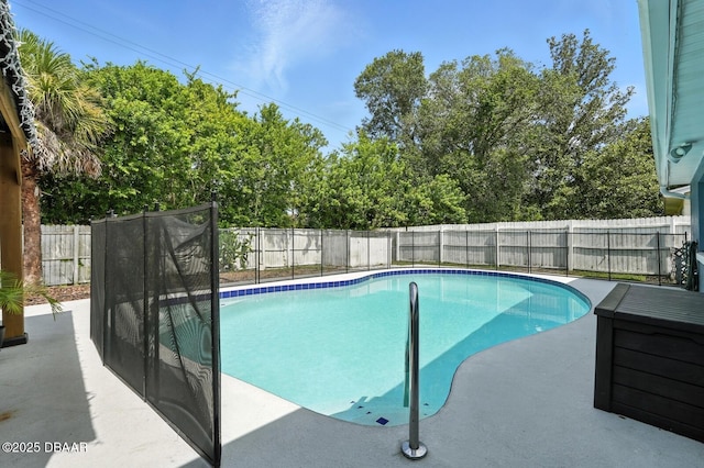 1720 Hope Dr, Ormond Beach, FL 32174 - view of pool with a fenced backyard, a patio, and view of wooded area