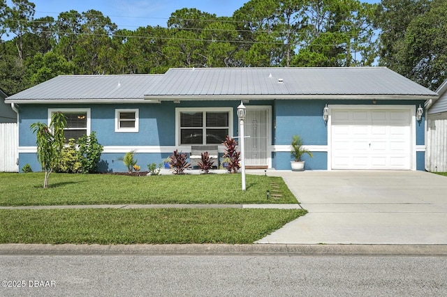 1720 Hope Dr, Ormond Beach, FL 32174 - ranch-style house with an attached garage, concrete driveway, stucco siding, a metal roof, and a front lawn