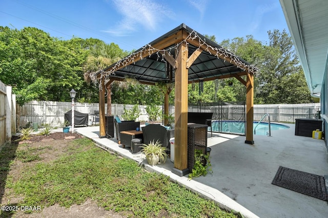 1720 Hope Dr, Ormond Beach, FL 32174 - fenced backyard with a gazebo, a patio, and outdoor lounge area