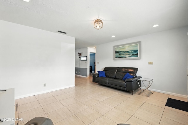 1720 Hope Dr, Ormond Beach, FL 32174 - living room with light tile patterned flooring and recessed lighting