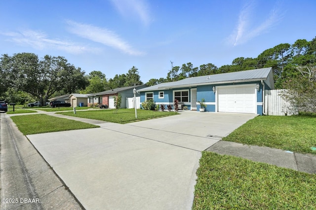 1720 Hope Dr, Ormond Beach, FL 32174 - ranch-style house with concrete driveway, a garage, a metal roof, and stucco siding
