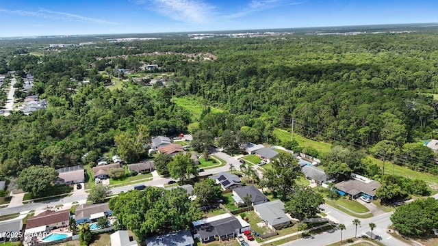 1720 Hope Dr, Ormond Beach, FL 32174 - aerial view of property and surrounding area with a heavily wooded area