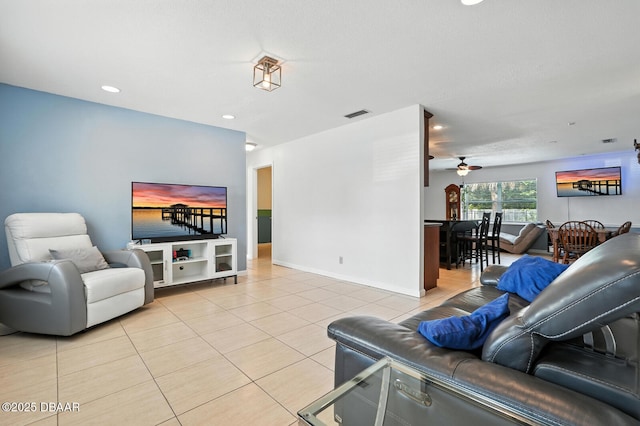 1720 Hope Dr, Ormond Beach, FL 32174 - living room featuring light tile patterned floors, ceiling fan, and recessed lighting