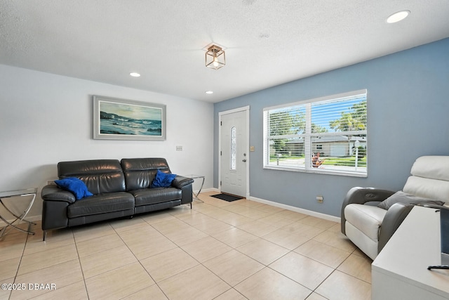 1720 Hope Dr, Ormond Beach, FL 32174 - living room with light tile patterned flooring and recessed lighting