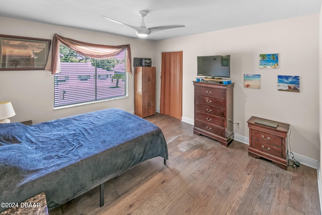 bedroom featuring ceiling fan and wood-type flooring