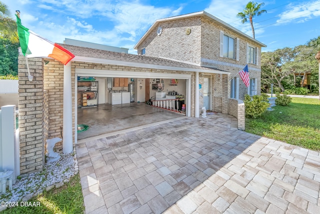 view of property exterior with a garage and a yard