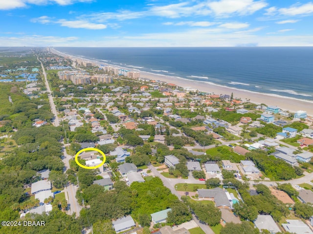 aerial view with a view of the beach and a water view