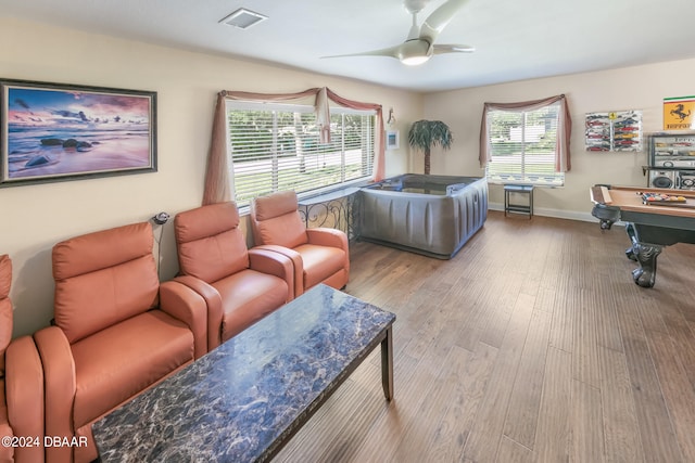 bedroom featuring ceiling fan, pool table, and light hardwood / wood-style flooring