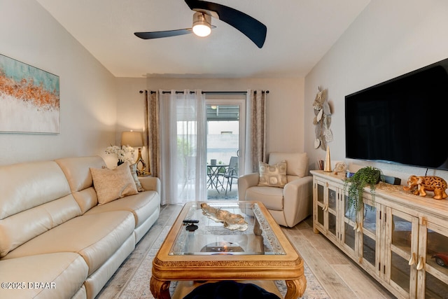 living room featuring ceiling fan