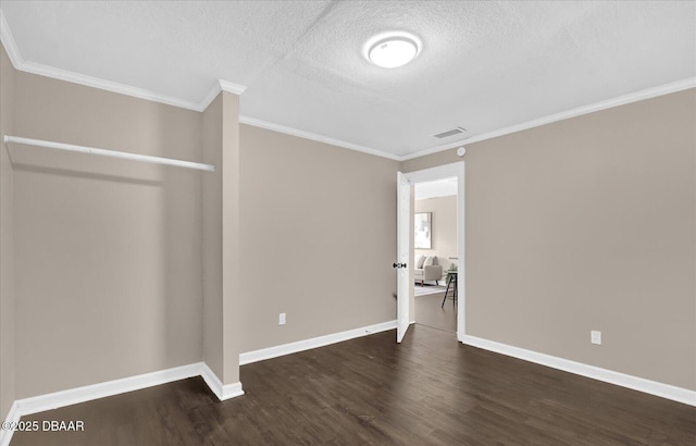 461 Brentwood Dr, Daytona Beach, FL 32117 - unfurnished bedroom featuring wood finished floors, a textured ceiling, and ornamental molding