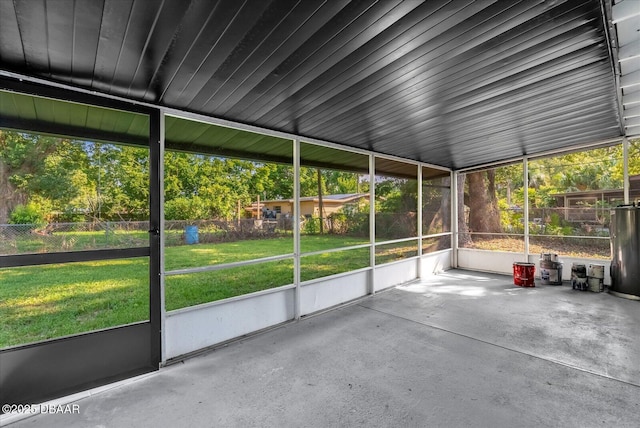461 Brentwood Dr, Daytona Beach, FL 32117 - unfurnished sunroom featuring water heater and plenty of natural light