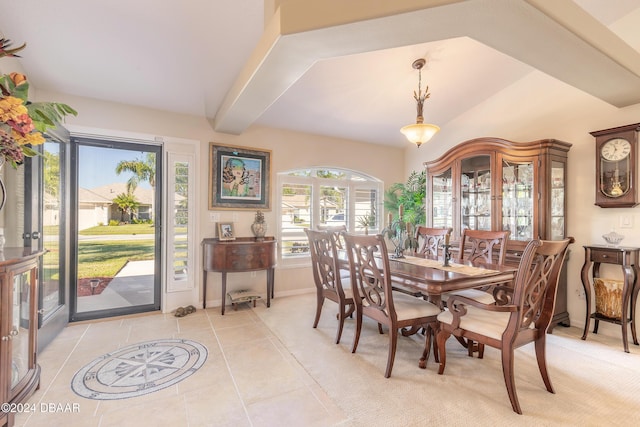 5452 Saint Regis Way, Port Orange, FL 32128 - dining area featuring light tile patterned floors and beamed ceiling