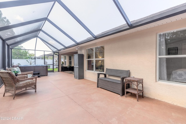 5452 Saint Regis Way, Port Orange, FL 32128 - view of patio / terrace with a hot tub and a lanai